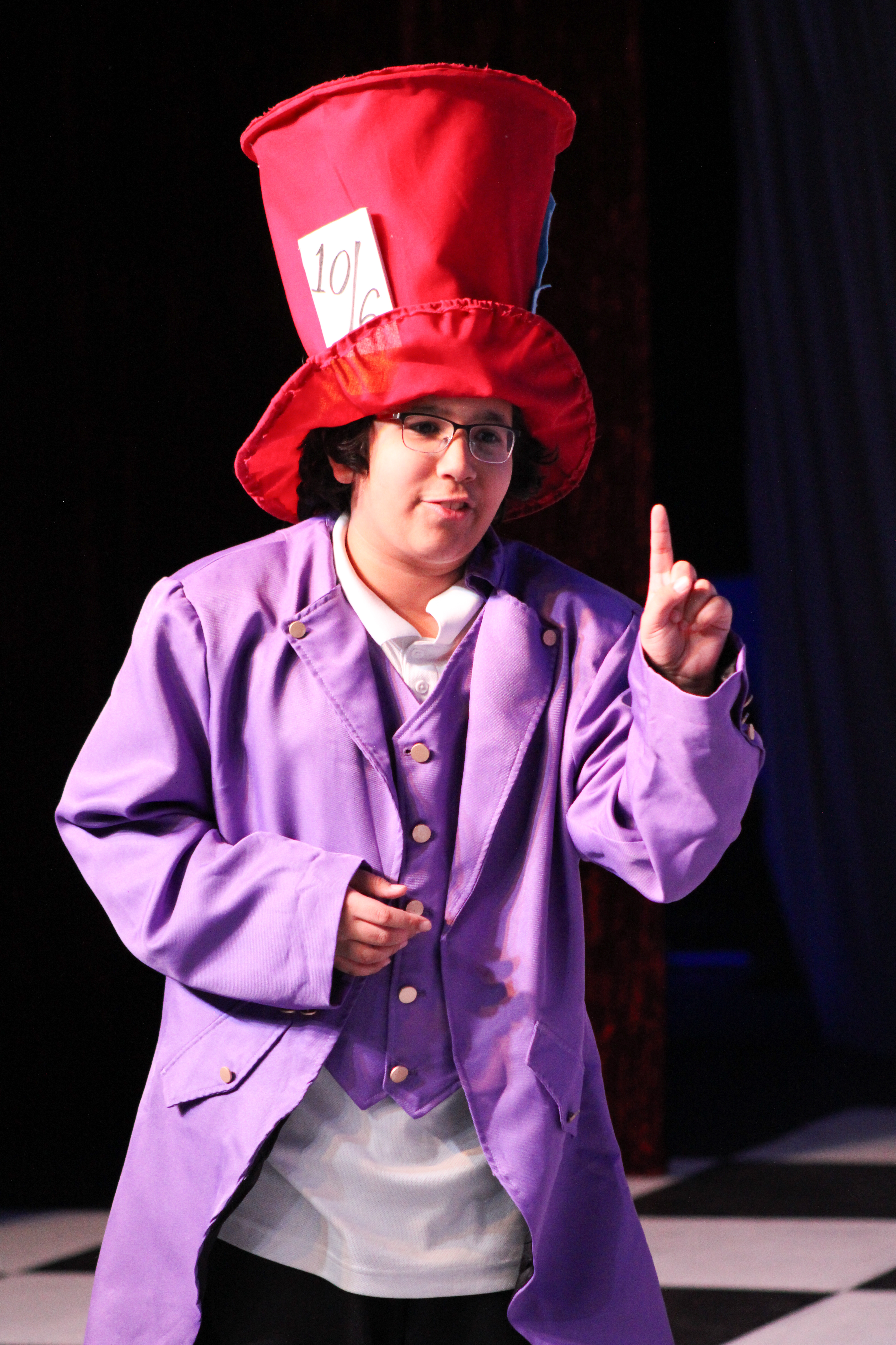 Raiden Fernandes as the Mad Hatter in Alice in Wonderland Jr.